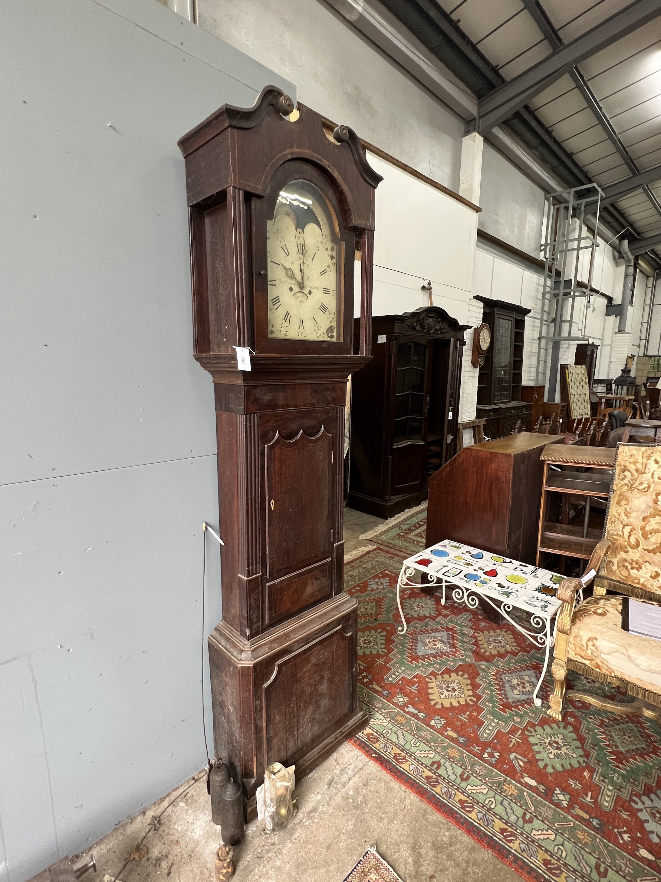 An early 19th century mahogany banded oak eight day North Country longcase clock, the moonphase dial marked Tuoman, Chester, height 225cm